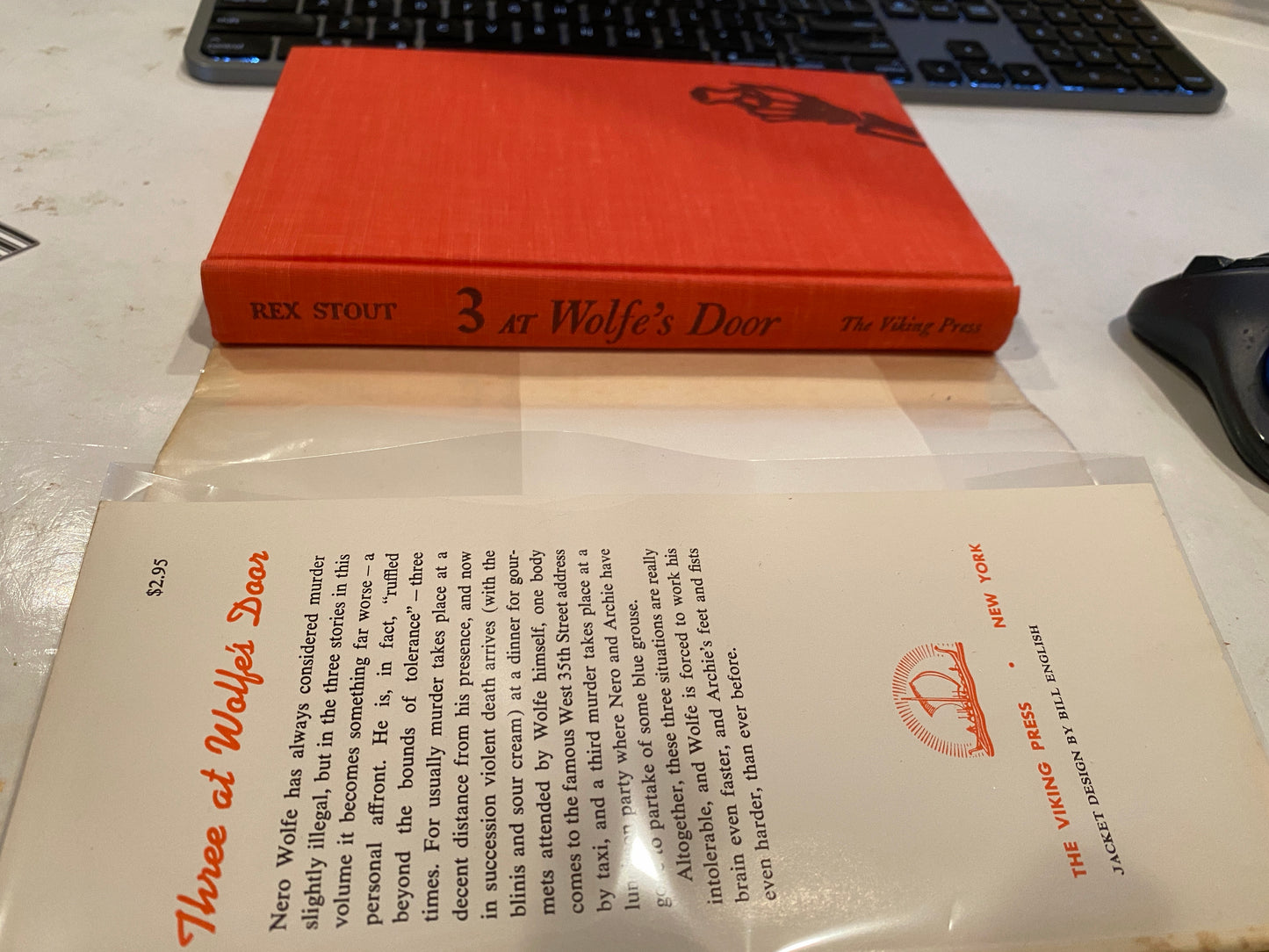 THREE AT WOLFE'S DOOR ( review copy)