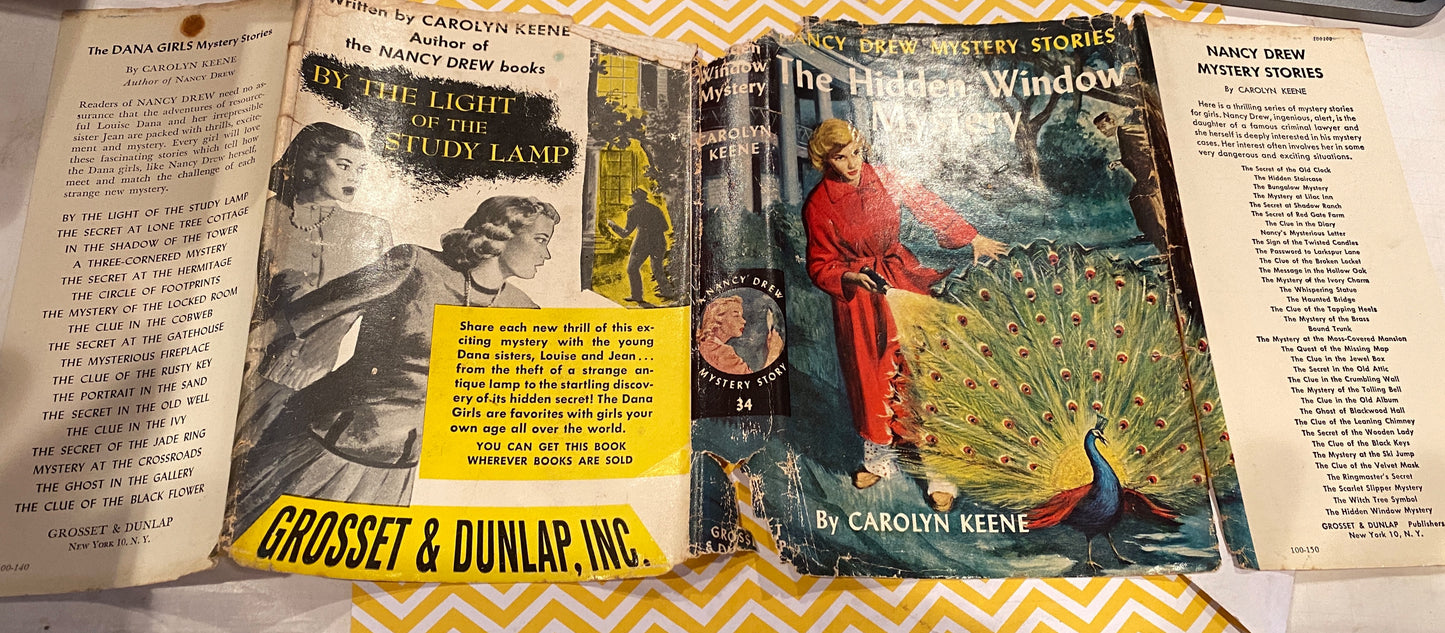 THE HIDDEN WINDOW MYSTERY  (1957a-1) Nancy Drew