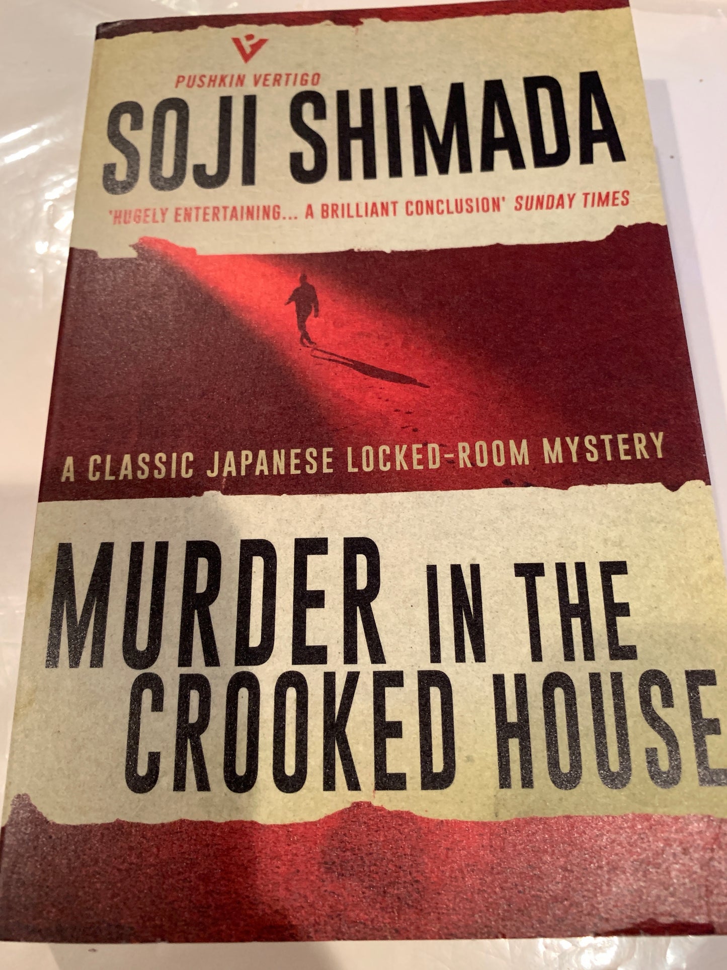 MURDER IN THE CROOKED HOUSE